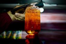 Botella de licor adulterado 